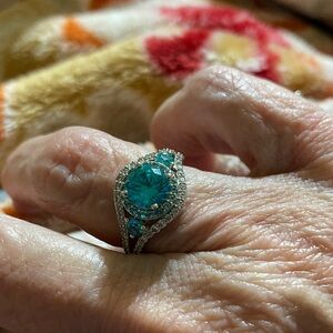 DANBURY MINT SIMULATED rare Paraiba tourmaline surrounded by silver tone setting